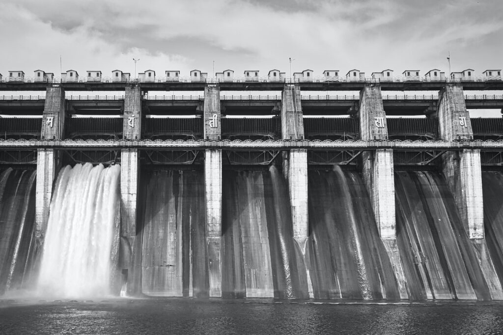 Grayscale Photo of a Dam